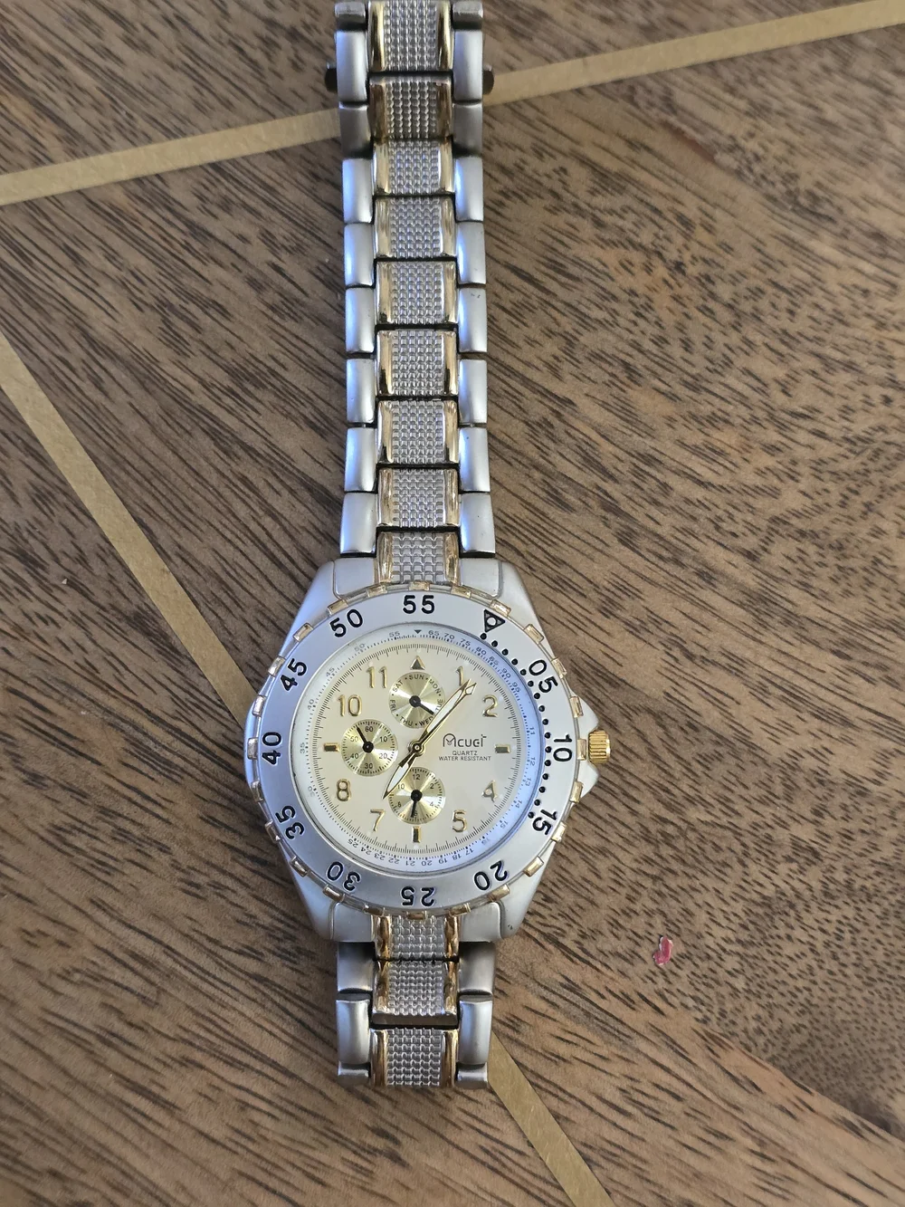 mcuci gold tone